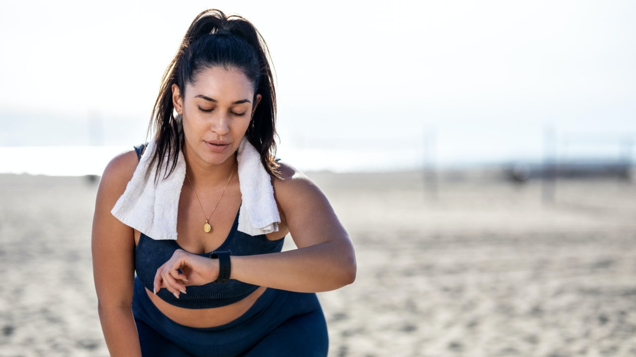 Woman looking at her smartwatch