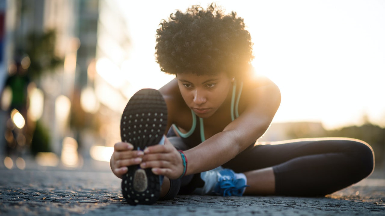 Woman doing some stretches before exercising