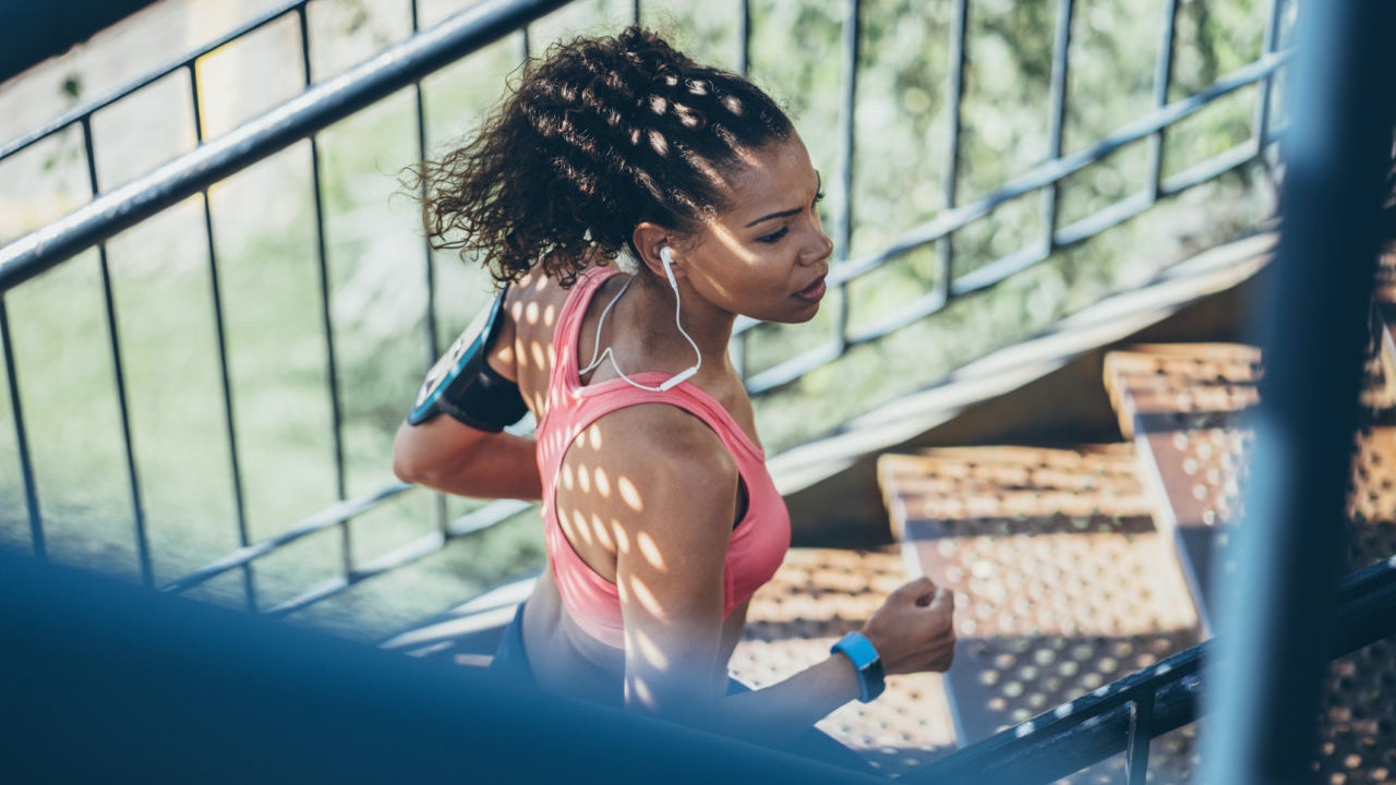 Girl running up the stairs